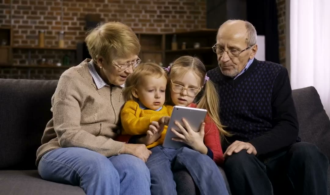 Young children with their grandparents