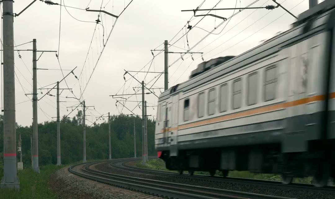 Train heading along a rural route
