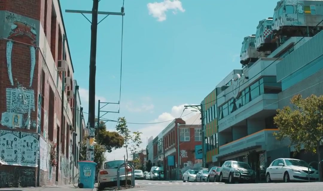 Urban hipster riding in a city street