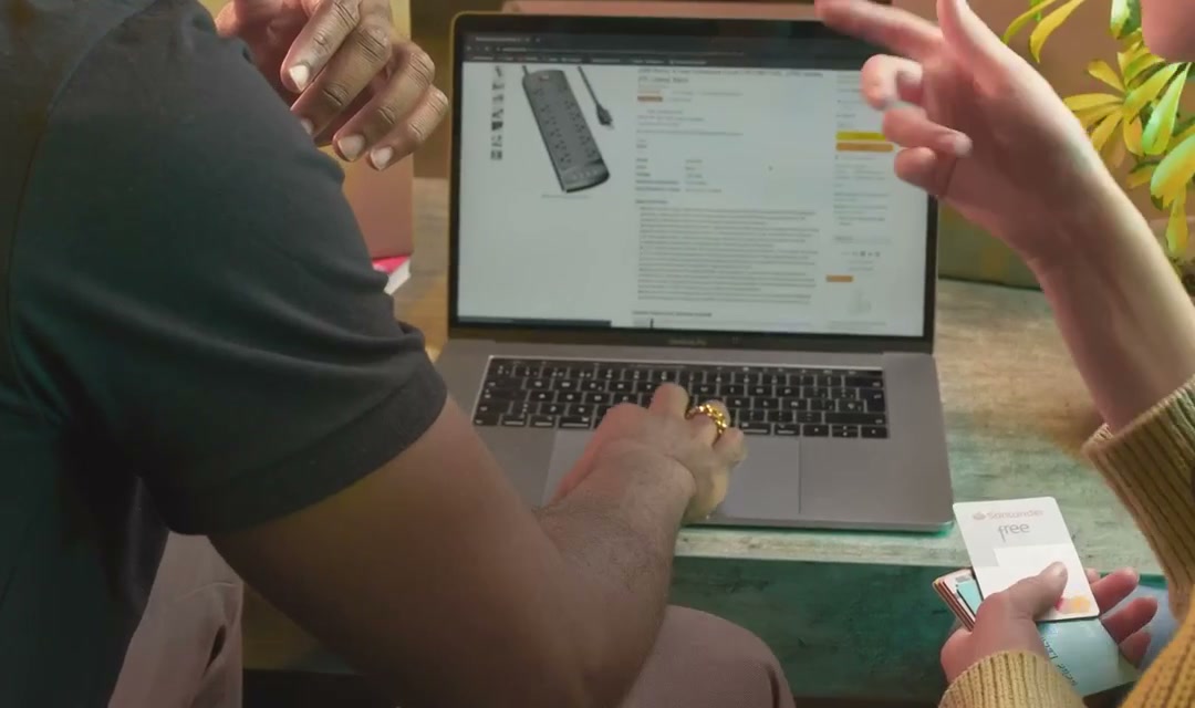 Man and woman buying online on a laptop